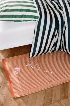 HAY Tapis Rug, Red -Hay Tapis Mat red Ete Duvet Cover midnight blue and light grey Ete Pillow Case dark green